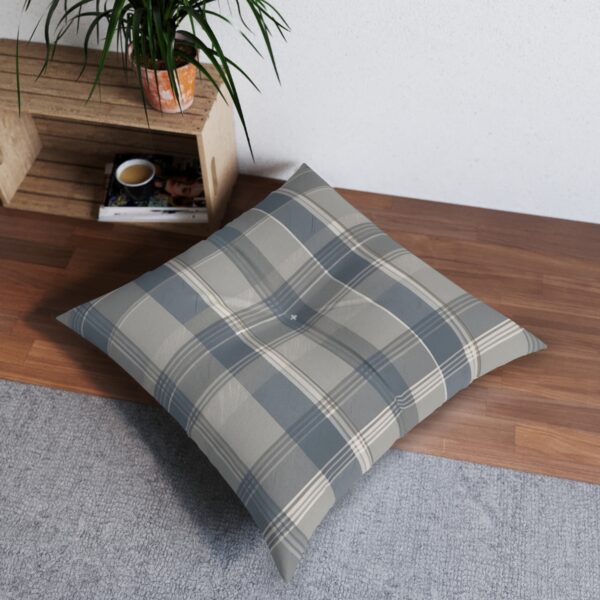 Tufted floor pillow with sleek plaid design in olive and ivory