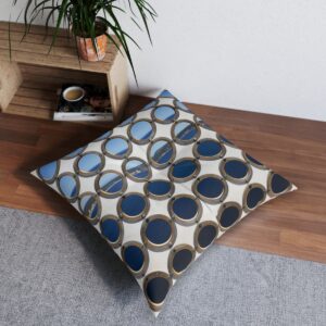 Contemporary style tufted floor pillow with regimented portholes and navy stripes