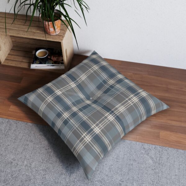 Elegant tufted floor pillow with refined plaid design in soft grey and subtle beige