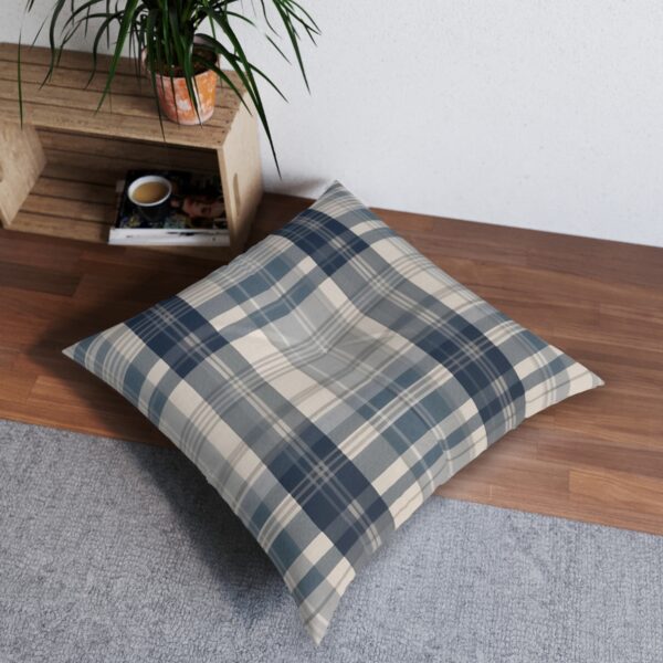 Stylish tufted floor pillow with classic plaid design in beige navy and light blue