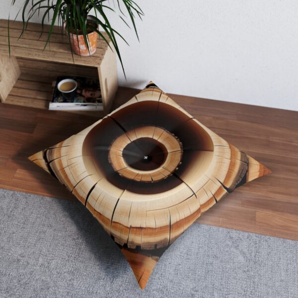 Tree ring pattern tufted floor pillow in gradient tan to deep brown