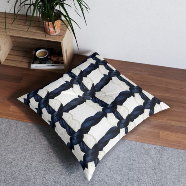 Detailed sailor's knots guide on a tufted floor pillow with navy stripes