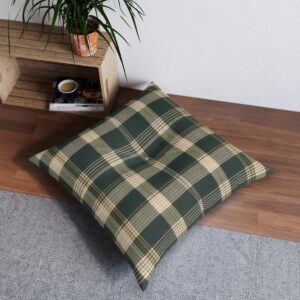 Classic plaid tufted floor pillow in ivy green and gold on wooden floor