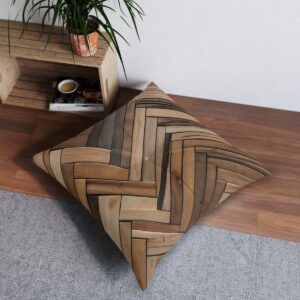 Square tufted floor pillow with a striking herringbone wood pattern in rich tones