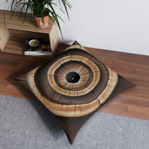 Square tufted floor pillow with concentric tree ring design