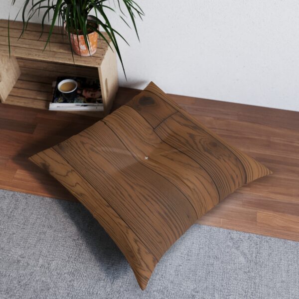 Square tufted floor pillow with teak wood grain design