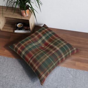 Tufted floor pillow with red, green, and brown plaid design on hardwood floor