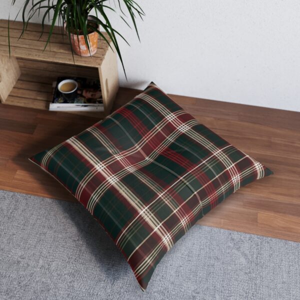 Plush square tufted floor pillow with red and green plaid pattern