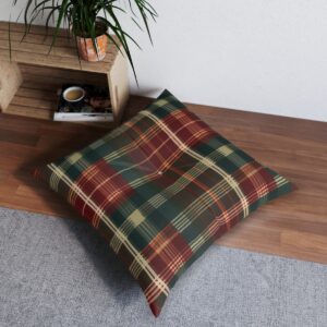 Plaid pattern tufted floor pillow square on wooden floor near plant