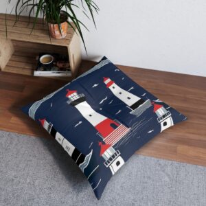 Tufted floor pillow adorned with lighthouses and ships amidst navy stripes