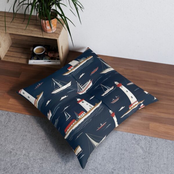 Tufted floor pillow with lighthouse motif for nautical serenity