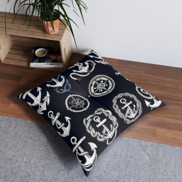 Comfortable tufted floor pillow with bold sailor tattoo design