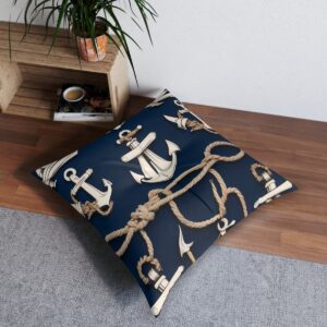 Navy blue floor pillow with sailor-inspired anchors and knotted ropes