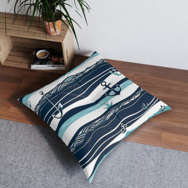 Coastal serenity tufted floor pillow with liferings and anchors on waves