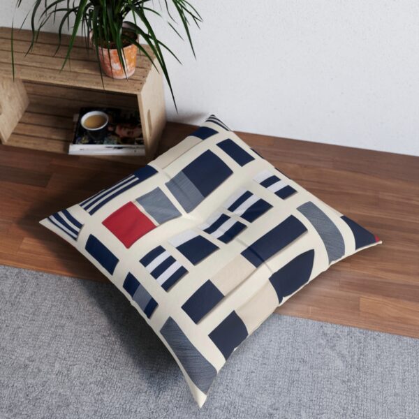 Modern maritime design tufted floor pillow on wooden floor