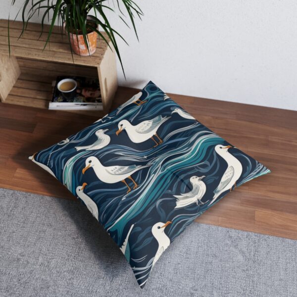 Floor pillow with seagulls over sea waves pattern