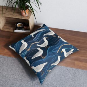 Dark sea tufted floor pillow with playful seagulls in flight pattern