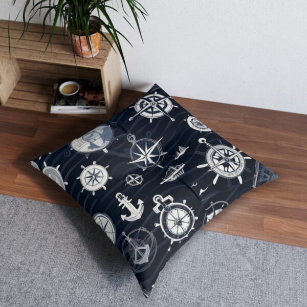 Tufted floor pillow with maritime wheels and anchors pattern