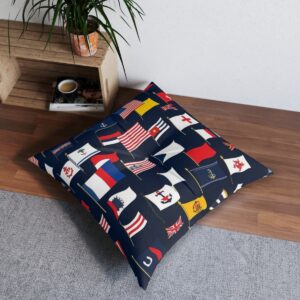 Assorted maritime signal flags patchwork tufted floor pillow on navy background