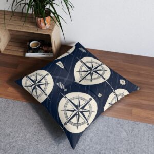 Large compass and sextant design tufted floor pillow on wooden floor