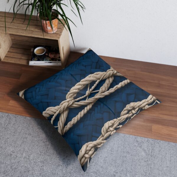 Floor pillow with nautical rope design on serene blue background