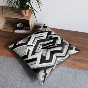 Chic geometric black and white tufted floor pillow with center stitch