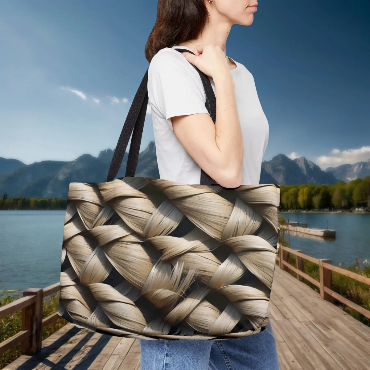 Woman holding a weekender tote bag with realistic blond basket weave texture design