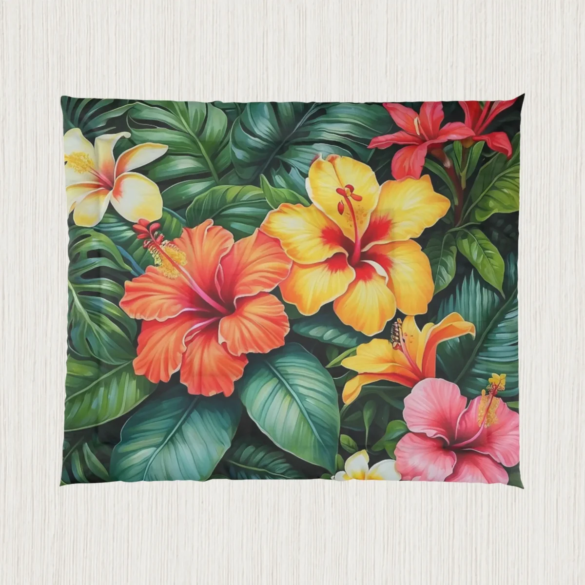 Flat view of comforter with detailed hibiscus flowers and tropical green leaves