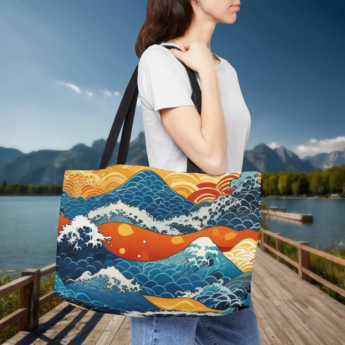Woman carrying a weekender tote bag with traditional Japanese wave design