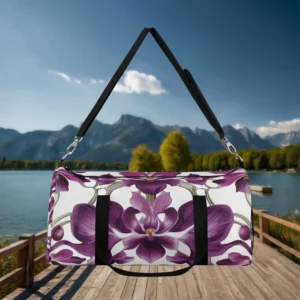 Front view of a large duffel bag with vibrant purple orchid print and black straps.