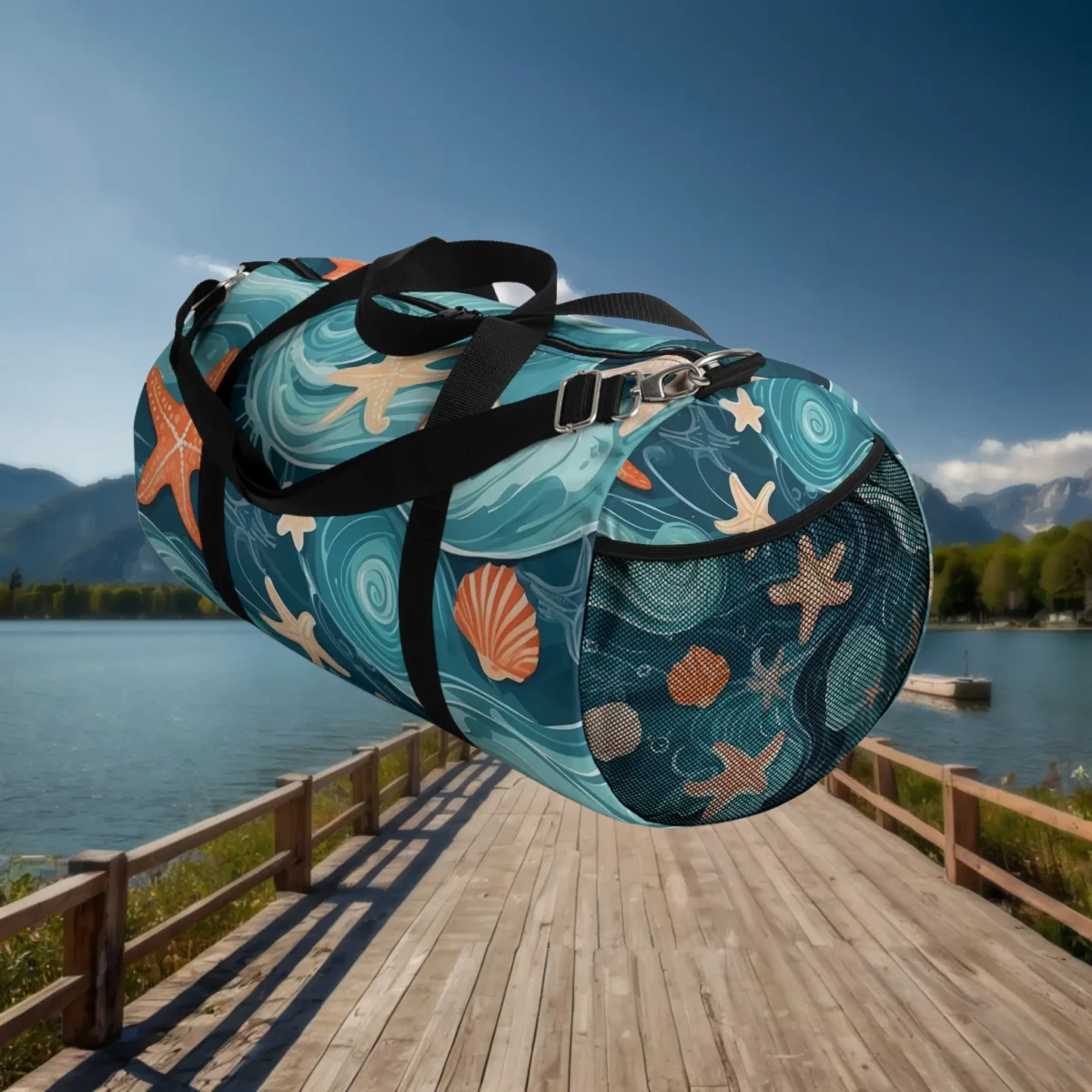 Side mesh pocket view of large duffel bag with swirling waves, starfish, and shells.