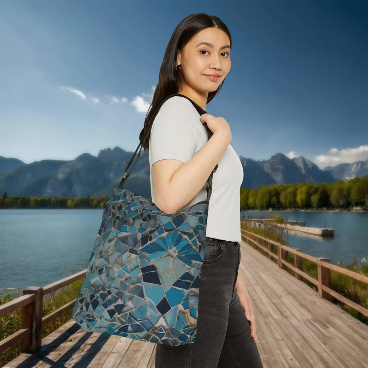 Woman carrying Moroccan Mosaic tote bag with blue geometric tile design