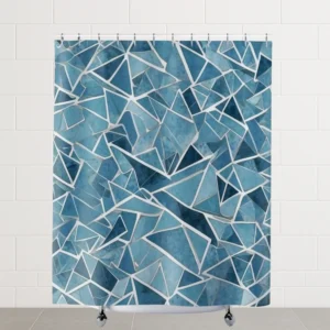 Blue shower curtain with abstract geometric angular pattern on display