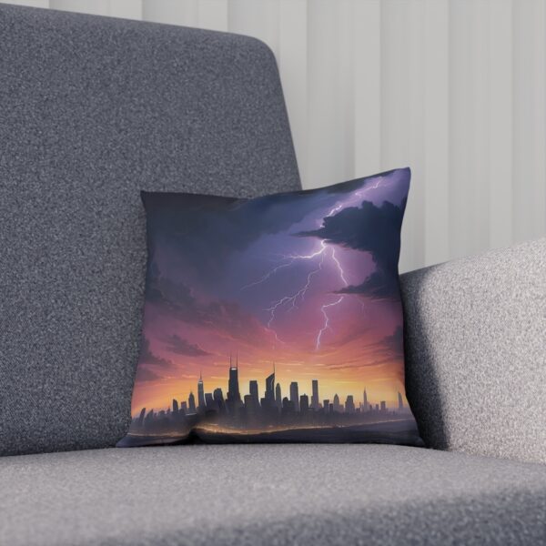 Cushion with city skyline and dramatic purple storm clouds with lightning on sofa