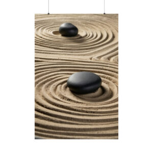 Smooth black stones placed in circular raked sand patterns in a zen garden