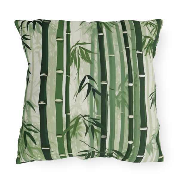 outdoor pillow featuring tall green bamboo stalks with leaves on a light background