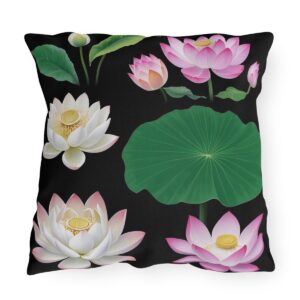 outdoor pillow featuring pink and white lotus flowers with green leaves on a black background