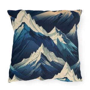 outdoor pillow featuring an abstract design of mountain peaks in various shades of blue and white