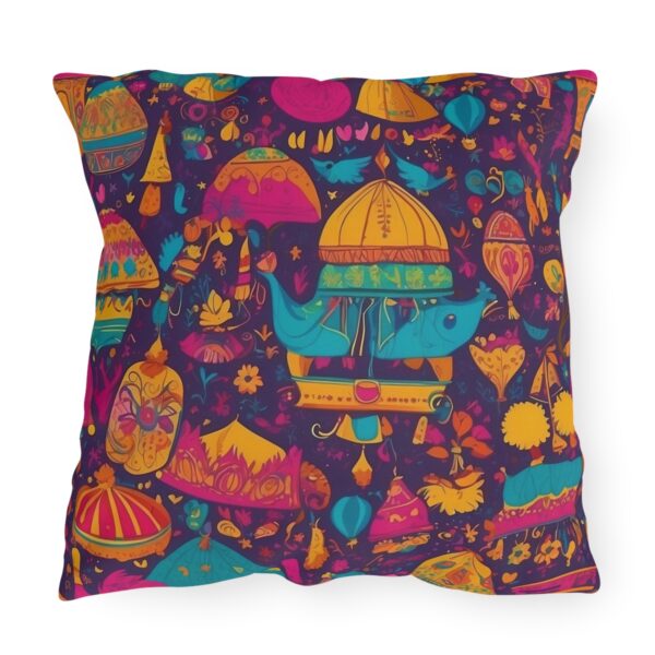 outdoor pillow featuring colorful festival-themed designs with tents, lanterns, and elephants on a dark background