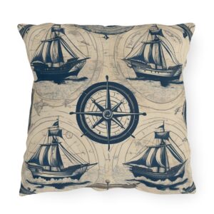 outdoor pillow featuring vintage sailing ships and a compass on a beige background