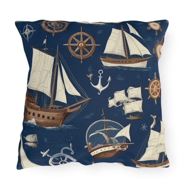 outdoor pillow featuring various sailing ships, anchors, and nautical elements on a navy blue background