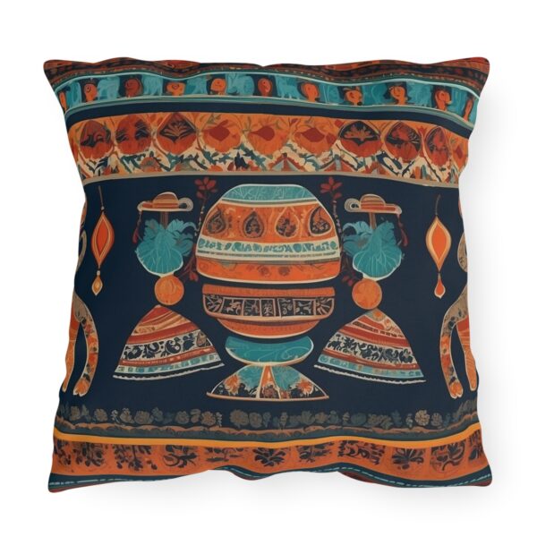 Outdoor pillow with intricate cultural patterns and textiles in vibrant colors on a dark background.