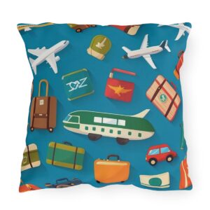 Outdoor pillow with a colorful design featuring travel icons like airplanes, luggage, and cars