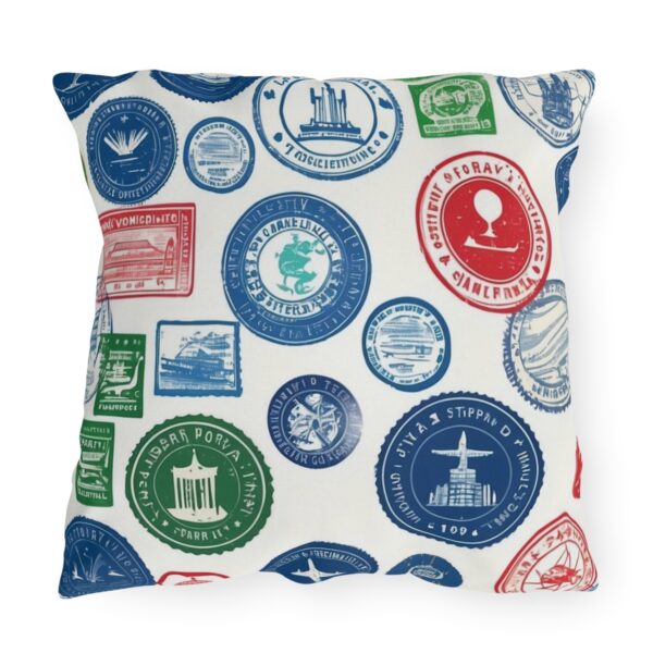 Outdoor pillow with colorful passport stamps design on white background