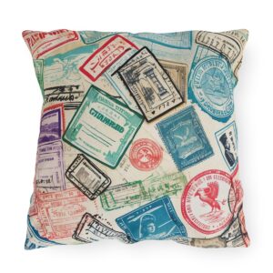 Outdoor pillow with colorful passport stamps design on cream background