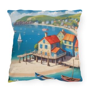 Outdoor pillow featuring a bright coastal beach scene with boats, houses, and calm blue water