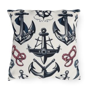 Outdoor pillow with white background featuring black anchors and red rope design