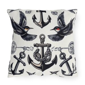 Outdoor pillow with white background and black anchor and bird design