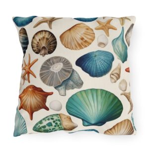 Outdoor pillow with white background and colorful assorted seashell and starfish design