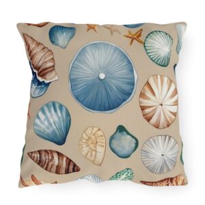 Outdoor pillow with beige background and colorful seashell and starfish design